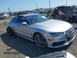 2016 Audi A7 Prestige z VIN WAU2GAFC5GN069837, wystawiony jako IAAI lot #42406421 z przebiegiem 104 820 mil mil oraz . Historia ofert i sprzedaży dostępna na DreamBid. Obrazek 1.