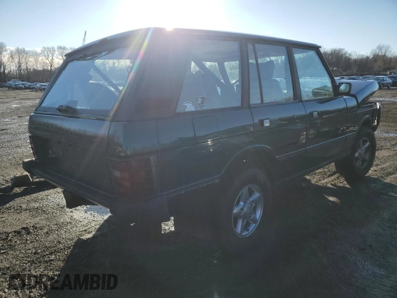 1994 Land Rover Range Rover with VIN SALHV1245RA640425, listed as a Copart auction lot 84764404 with 173,181 mi miles and Salvage Title. Bid and sale history available at DreamBid. Image 3.