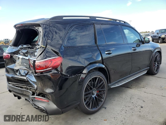 2021 Mercedes-Benz GLS 63 AMG with VIN 4JGFF8KEXMA308157, listed as a Copart auction lot 74989543 with 27,440 mi miles and . Bid and sale history available at DreamBid. Image 3.