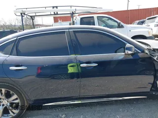 2015 Infiniti Q70 with VIN JN1BY1PP7FM601789, listed as a IAAI auction lot 41782519 with 140,158 mi miles and . Bid and sale history available at DreamBid. Image 14.