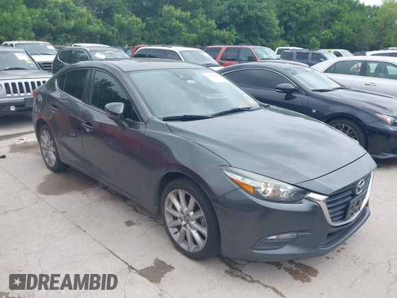 2017 Mazda 3 Touring with VIN 3MZBN1V74HM121397, listed as a IAAI auction lot 42143495 with 194,122 mi miles and . Bid and sale history available at DreamBid. Image 1.