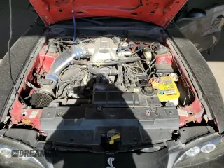 1997 Ford Mustang Cobra with VIN 1FALP47V8VF103811, listed as a Copart auction lot 56455324 with 129,499 mi miles and Salvage Title. Bid and sale history available at carsss.com. Image 11.