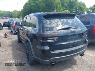 2014 Jeep Grand Cherokee Limited with VIN 1C4RJFBG3EC545861, listed as a IAAI auction lot 42216743 with 160,000 mi miles and . Bid and sale history available at DreamBid. Image 3.