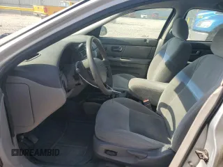 2004 Ford Taurus SE with VIN 1FAFP53U04G133586, listed as a Copart auction lot 59972925 with 228,938 mi miles and Salvage title. Bid and sale history available at DreamBid. Image 7.