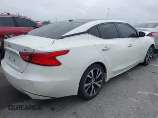 2018 Nissan Maxima SL with VIN 1N4AA6AP9JC399142, listed as a IAAI auction lot 42115954 with 77,191 mi miles and . Bid and sale history available at DreamBid. Image 4.