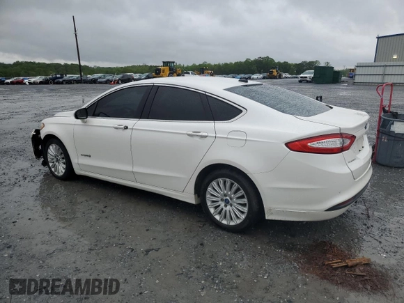 2013 Ford Fusion SE Hybrid with VIN 3FA6P0LU1DR358983, listed as a Copart auction lot 51907665 with 143,459 mi miles and Salvage Title. Bid and sale history available at DreamBid. Image 2.