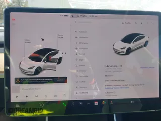 2020 Tesla Model 3 Long Range with VIN 5YJ3E1EBXLF636963, listed as a IAAI auction lot 41826249 with 68,085 mi miles. Bid and sale history available at carsss.com. Image 18.