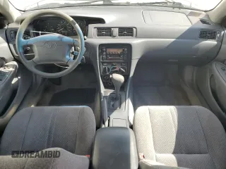 2000 Toyota Camry CE with VIN JT2BG22K9Y0520572, listed as a Copart auction lot 51062815 with 130,878 mi miles and Salvage Title. Bid and sale history available at DreamBid. Image 8.