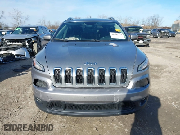 2014 Jeep Cherokee Latitude with VIN 1C4PJMCSXEW125737, listed as a IAAI auction lot 41863778 with 120,226 mi miles. Bid and sale history available at carsss.com. Image 12.