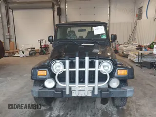 2005 Jeep Wrangler X with VIN 1J4FA39S95P356033, listed as a IAAI auction lot 42252776 with 40,512 mi miles and . Bid and sale history available at DreamBid. Image 12.