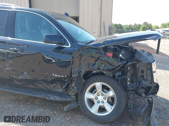 2019 Chevrolet Tahoe LT with VIN 1GNSKBKC1KR264324, listed as a IAAI auction lot 42474572 with 139,142 mi miles and . Bid and sale history available at DreamBid. Image 6.
