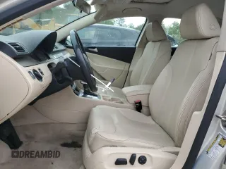 2009 Volkswagen Passat z VIN WVWJK93C49P054575, wystawiony jako Copart lot #57880855 z przebiegiem 148 327 mil mil oraz Szkody całkowita. Historia ofert i sprzedaży dostępna na DreamBid. Obrazek 7.