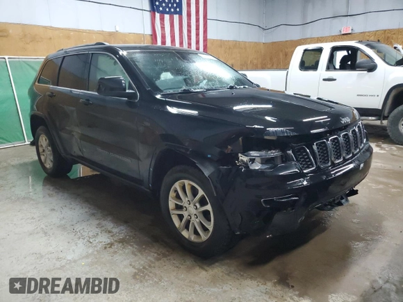 2021 Jeep Grand Cherokee Laredo E with VIN 1C4RJFAG4MC717010, listed as a Copart auction lot 56033035 with 75,054 mi miles and Salvage title. Bid and sale history available at DreamBid. Image 4.