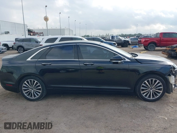 2018 Lincoln MKZ Select z VIN 3LN6L5C93JR620170, wystawiony jako IAAI lot #41488730 z przebiegiem 101 040 mil mil oraz . Historia ofert i sprzedaży dostępna na DreamBid. Obrazek 14.