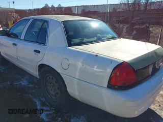 2005 Ford Police Interceptor z VIN 2FAFP71WX5X164985, wystawiony jako IAAI lot #41363721 z przebiegiem 147 950 mil mil oraz . Historia ofert i sprzedaży dostępna na DreamBid. Obrazek 6.
