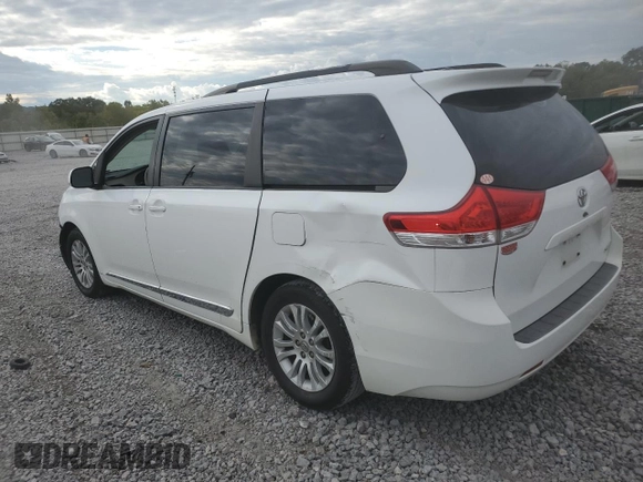 2011 Toyota Sienna XLE AAS with VIN 5TDYK3DC9BS120849, listed as a Copart auction lot 74142764 with 190,217 mi miles and Salvage Title. Bid and sale history available at carsss.com. Image 2.