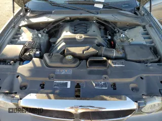 2004 Jaguar XJ with VIN SAJWA71C74SG20299, listed as a Copart auction lot 79469504 with 78,134 mi miles and Salvage Title. Bid and sale history available at carsss.com. Image 12.