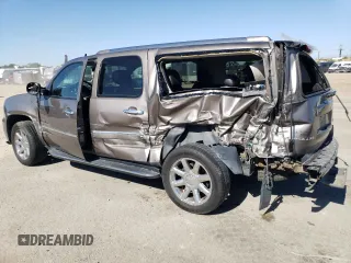 2014 GMC Yukon XL Denali with VIN 1GKS2MEF1ER107346, listed as a Copart auction lot 67927133 with 77,793 mi miles and Salvage Title. Bid and sale history available at carsss.com. Image 2.