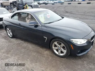 2015 BMW 4 Series 428i with VIN WBA3V7C55FP772912, listed as a IAAI auction lot 41787037 with 76,239 mi miles. Bid and sale history available at carsss.com. Image 1.
