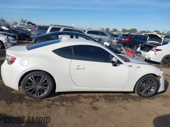 2015 Scion FR-S z VIN JF1ZNAA13F8713996, wystawiony jako IAAI lot #41189792 z przebiegiem 92 730 mil mil oraz . Historia ofert i sprzedaży dostępna na DreamBid. Obrazek 13.