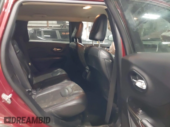 2015 Jeep Cherokee Trailhawk with VIN 1C4PJMBS7FW646577, listed as a IAAI auction lot 41404911 with 85,343 mi miles and . Bid and sale history available at DreamBid. Image 8.
