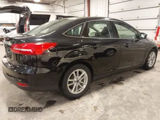 2018 Ford Focus SE with VIN 1FADP3F23JL215479, listed as a IAAI auction lot 41936036 with 96,560 mi miles. Bid and sale history available at carsss.com. Image 4.