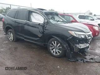 2021 Honda Pilot EX-L with VIN 5FNYF6H59MB021022, listed as a IAAI auction lot 42713636 with Not provided miles and . Bid and sale history available at DreamBid. Image 1.