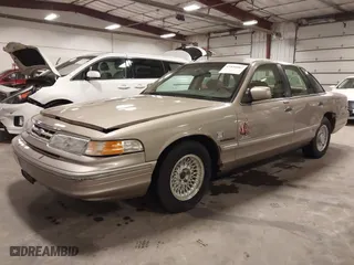 1995 Ford Crown Victoria LX with VIN 2FALP74W0SX195270, listed as a IAAI auction lot 41840082 with 139,967 mi miles. Bid and sale history available at carsss.com. Image 2.