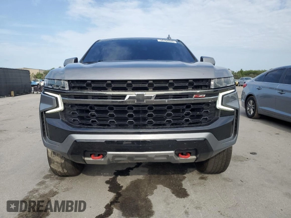 2021 Chevrolet Suburban Z71 с VIN 1GNSKDKD9MR385447, выставлен на аукционе Copart как лот 55764935 с пробегом 74 241 миль миль и Списание • Salvage title. История ставок и продаж доступна на DreamBid. Изображение 5.
