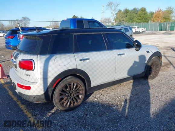 2019 MINI Clubman Cooper with VIN WMWLN5C56K2E34756, listed as a IAAI auction lot 41916663 with 85,860 mi miles and . Bid and sale history available at DreamBid. Image 4.