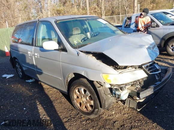 2002 Honda Odyssey EX z VIN 2HKRL18652H566576, wystawiony jako IAAI lot #40974704 z przebiegiem 232 172 mil mil oraz . Historia ofert i sprzedaży dostępna na DreamBid. Obrazek 1.