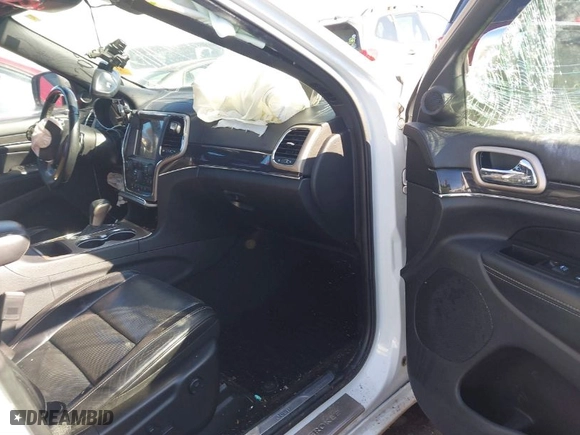 2017 Jeep Grand Cherokee Overland with VIN 1C4RJECG0HC636342, listed as a IAAI auction lot 41139209 with 145,760 mi miles. Bid and sale history available at carsss.com. Image 5.