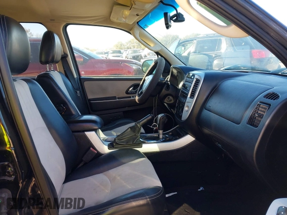 2007 Mercury Mariner Premier с VIN 4M2CU97127KJ20444, выставлен на аукционе IAAI как лот 40810464 с пробегом 163 702 миль миль и . История ставок и продаж доступна на DreamBid. Изображение 5.