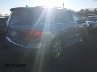2015 Mercedes-Benz GL-Class GL 450 with VIN 4JGDF6EEXFA471143, listed as a IAAI auction lot 41062987 with 134,674 mi miles. Bid and sale history available at carsss.com. Image 4.