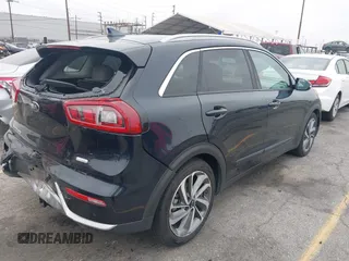 2017 Kia Niro Touring with VIN KNDCE3LC6H5048381, listed as a IAAI auction lot 42035129 with 133,559 mi miles. Bid and sale history available at carsss.com. Image 4.