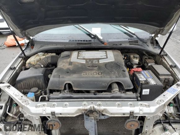 2003 Kia Sorento LX z VIN KNDJC733335030322, wystawiony jako Copart lot #77607974 z przebiegiem 109 777 mil mil oraz Szkoda całkowita • Salvage title. Historia ofert i sprzedaży dostępna na DreamBid. Obrazek 12.