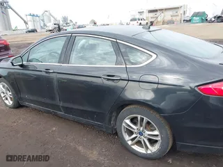 2015 Ford Fusion Titanium Hybrid with VIN 3FA6P0RU6FR299374, listed as a IAAI auction lot 41576007 with 191,285 mi miles. Bid and sale history available at carsss.com. Image 14.