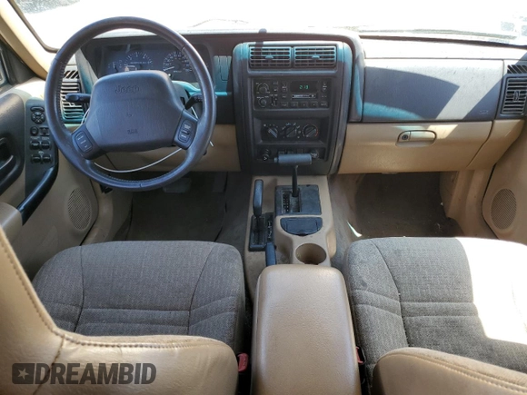 1999 Jeep Cherokee Sport z VIN 1J4FF68S7XL553295, wystawiony jako Copart lot #62390915 z przebiegiem 358 587 mil mil oraz Czysty tytuł • Clean title. Historia ofert i sprzedaży dostępna na DreamBid. Obrazek 8.