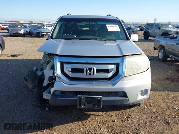2011 Honda Pilot EX with VIN 5FNYF3H41BB018182, listed as a IAAI auction lot 42000601 with 152,912 mi miles and . Bid and sale history available at carsss.com. Image 13.