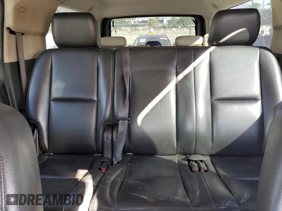 2011 Chevrolet Suburban z VIN 1GNWK5EG0BR121950, wystawiony jako Copart lot #82678394 z przebiegiem 154 952 mil mil oraz Szkoda całkowita • Salvage title. Historia ofert i sprzedaży dostępna na DreamBid. Obrazek 10.