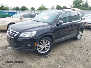 2011 Volkswagen Tiguan SEL with VIN WVGBV7AX6BW521525, listed as a IAAI auction lot 42490216 with 123,546 mi miles and . Bid and sale history available at DreamBid. Image 2.