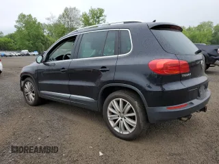 2013 Volkswagen Tiguan SE z VIN WVGBV7AX6DW550316, wystawiony jako Copart lot #56964595 z przebiegiem 157 526 mil mil oraz Szkoda całkowita • Salvage title. Historia ofert i sprzedaży dostępna na DreamBid. Obrazek 2.