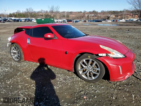 2014 Nissan 370Z Nismo with VIN JN1AZ4EH7EM630228, listed as a Copart auction lot 87024444 with 88,456 mi miles and Salvage title. Bid and sale history available at DreamBid. Image 4.