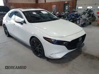 2021 Mazda 3 Premium with VIN JM1BPBML6M1348258, listed as a IAAI auction lot 42752477 with 35,285 mi miles and . Bid and sale history available at DreamBid. Image 1.