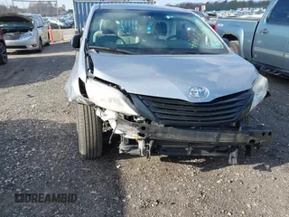 2015 Toyota Sienna L with VIN 5TDZK3DCXFS596277, listed as a IAAI auction lot 41229427 with 108,900 mi miles and . Bid and sale history available at DreamBid. Image 6.