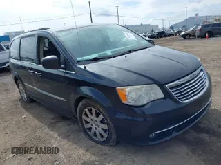2013 Chrysler Town & Country Touring with VIN 2C4RC1BG3DR792509, listed as a IAAI auction lot 42009785 with 209,239 mi miles. Bid and sale history available at carsss.com. Image 1.