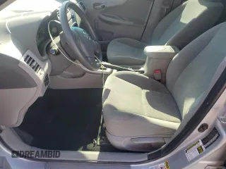 2010 Toyota Corolla with VIN 2T1BU4EE4AC356564, listed as a Copart auction lot 57343175 with 162,151 mi miles and Salvage title. Bid and sale history available at DreamBid. Image 7.