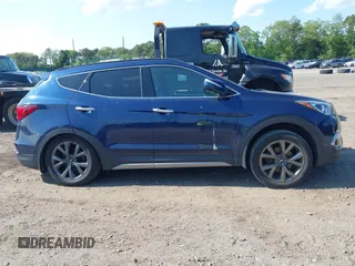 2018 Hyundai Santa Fe Ultimate with VIN 5XYZWDLA3JG571432, listed as a IAAI auction lot 42395245 with 69,330 mi miles and . Bid and sale history available at DreamBid. Image 13.