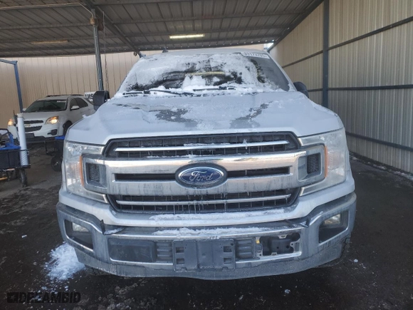 2019 Ford F-150 XL with VIN 1FTEW1E56KKE79112, listed as a Copart auction lot 89173705 with 127,015 mi miles and Salvage Title. Bid and sale history available at carsss.com. Image 5.