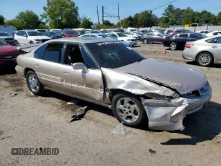 1998 Pontiac Bonneville SE z VIN 1G2HX52K0W4238012, wystawiony jako Copart lot #70997824 z przebiegiem 146 825 mil mil oraz Szkody całkowita. Historia ofert i sprzedaży dostępna na DreamBid. Obrazek 4.